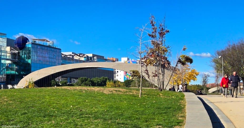 concrete shell bridge with steel deck, Madrid River Park. Walks in Madrid