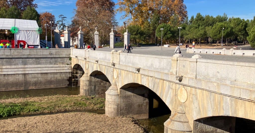 1930s stone pedestrian bridge with arches