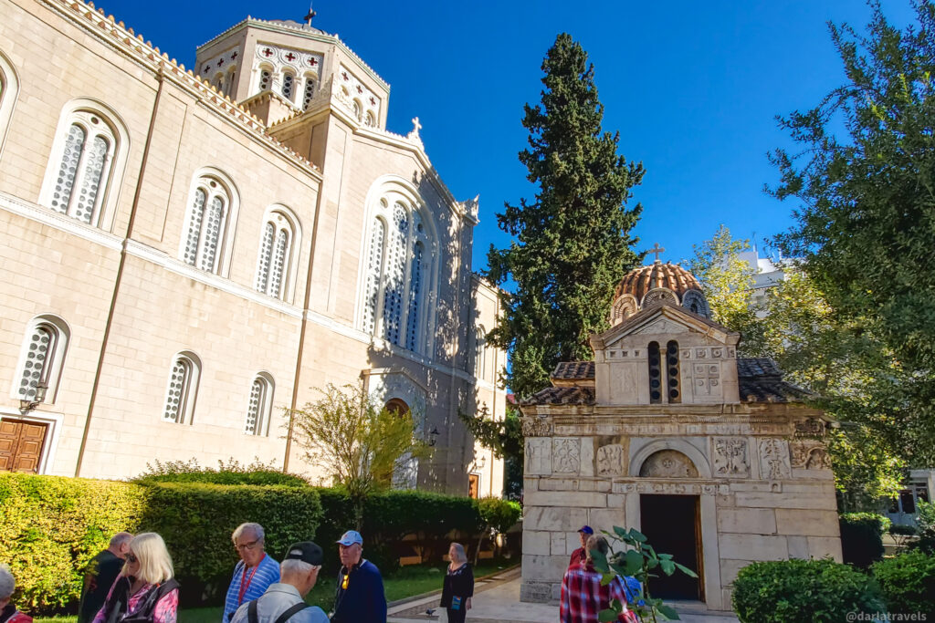 the Metropolitan Cathedral of Athens, officially the Metropolitan Cathedral of the Annunciation towers over the tiny Church of Agios Eleftherios