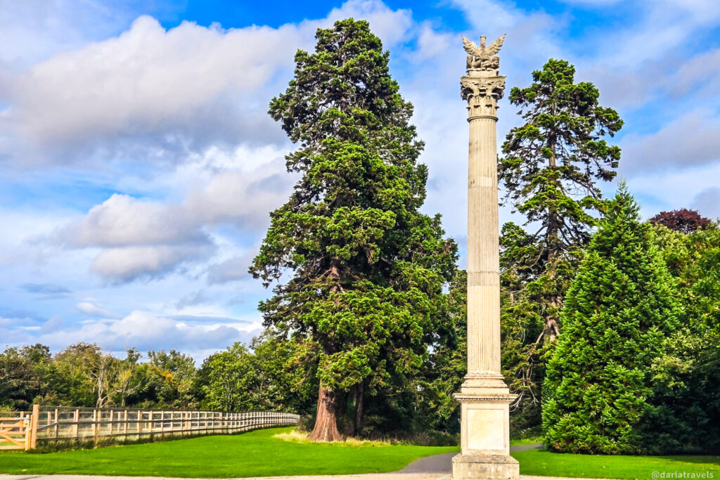 Ornate column topped with phoenix sculpture in Santry Demesne Park near Dublin Airport