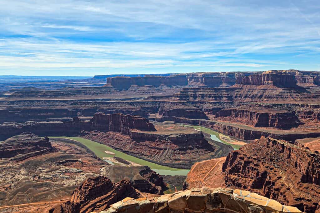 Canyon cliffs and a winding river seen from a short overlook hike near Dead Horse Point in Dead Horse Point State Park