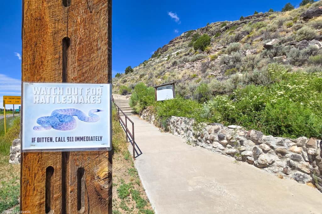 Watch out for rattlesnakes warning sign at the entrance to the Stations of the Cross trail in San Luis Colorado