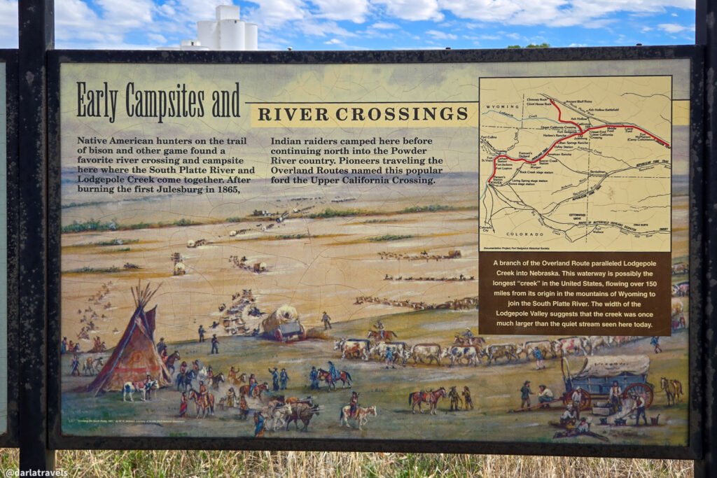 Interpretive panel illustrating early campsites and river crossings, with a map of historic overland routes.